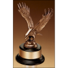 Fully modeled antique bronze eagle casting on a black wood base